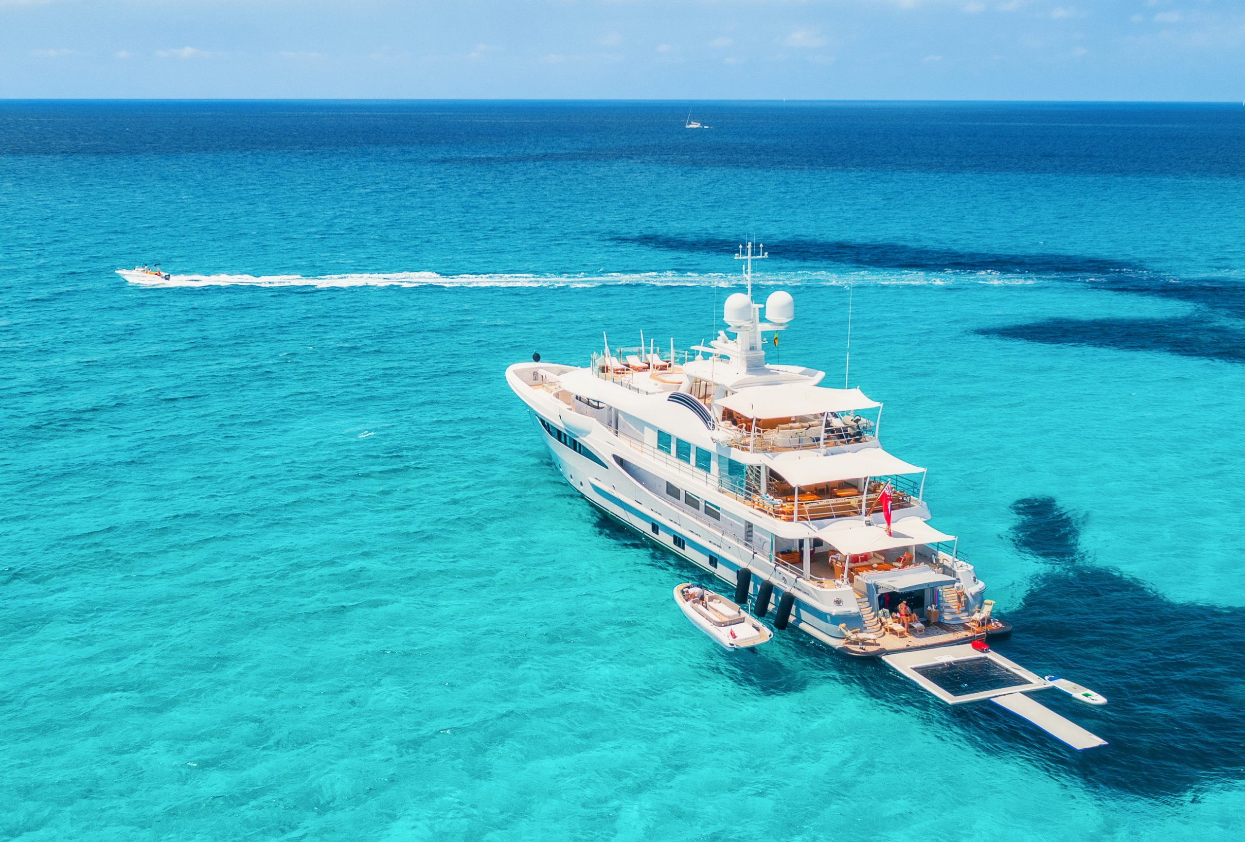 Luxury yacht at anchor in turquoise Caribbean water